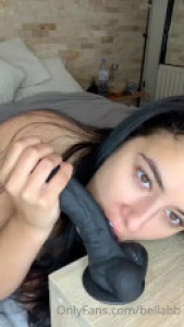 Bellabb Thrusts A Black Dildo Inside Her Cunt